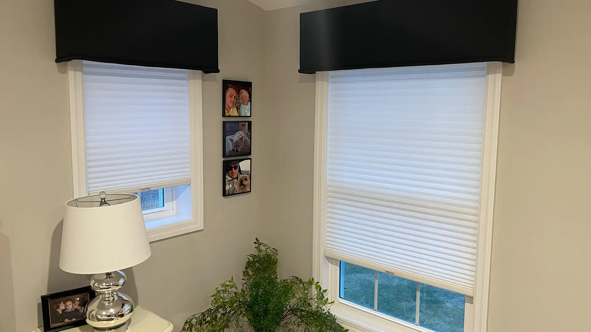 Cozy living room with insulating cellular shades in winter.